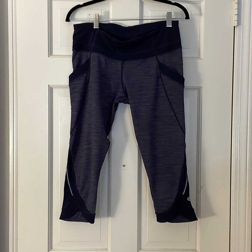 Lululemon crop leggins size 10 -purple and black horizontal thin strips